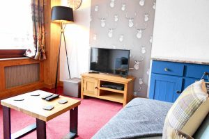 Open plan living room with smart TV with access to free Wi-Fi