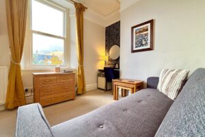 Room 2 – Seating area with desk space and fell views over Keswick.